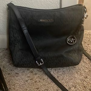 Michael Kors Crossbody handbag in black.